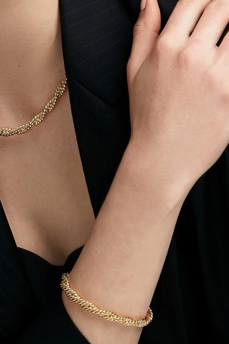 Rho Braided Twisting Links Bracelet Gold